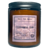 a picture of a cinnamon bun scented 8 oz soy wax candle
