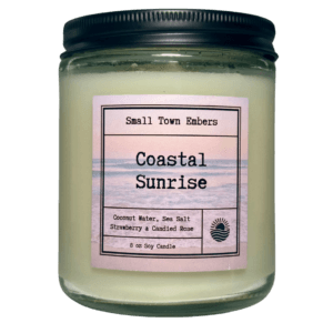 a picture of a coastal sunrise scented 8 oz soy wax candle