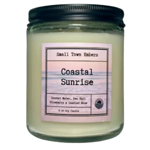 a picture of a coastal sunrise scented 8 oz soy wax candle