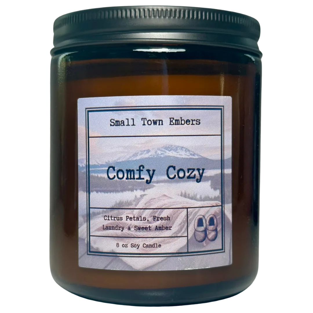 a picture of a comfy cozy scented 8 oz soy wax candle